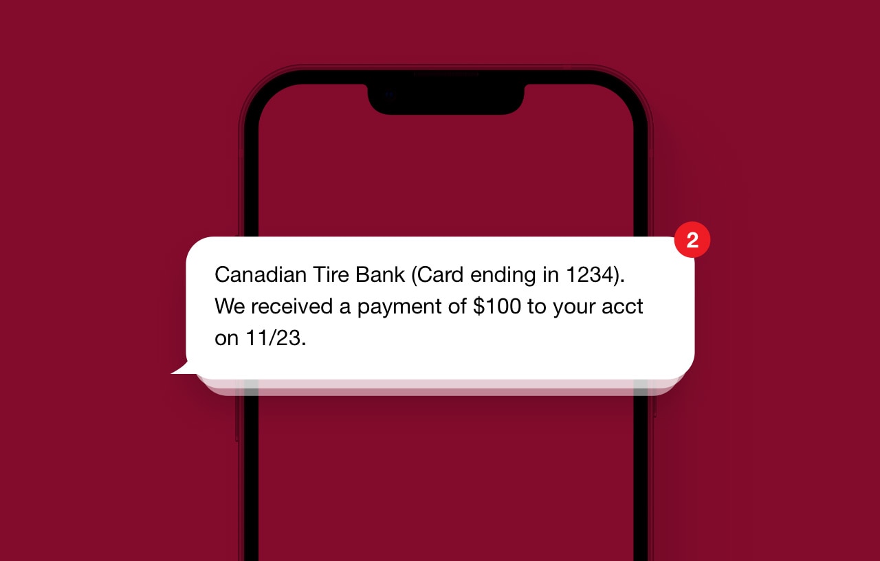 the outline of a phone screen with a notify me text alert popping up on screen about canadian tire bank successfully receiving a payment